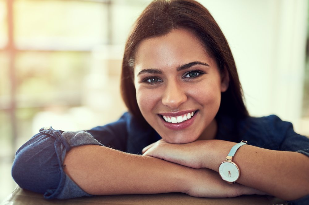 Young woman with a confident, natural-looking smile